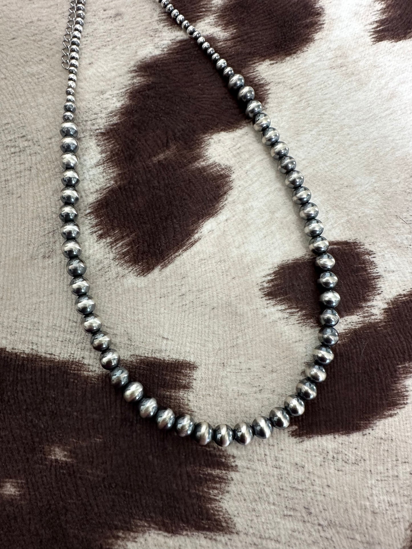 the pearly necklace