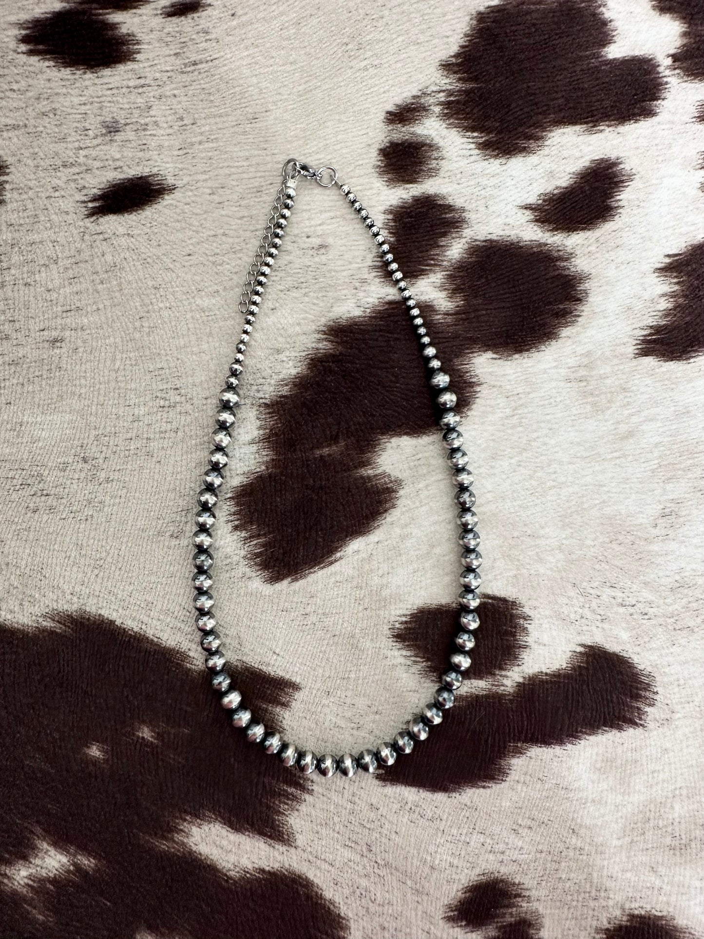 the pearly necklace