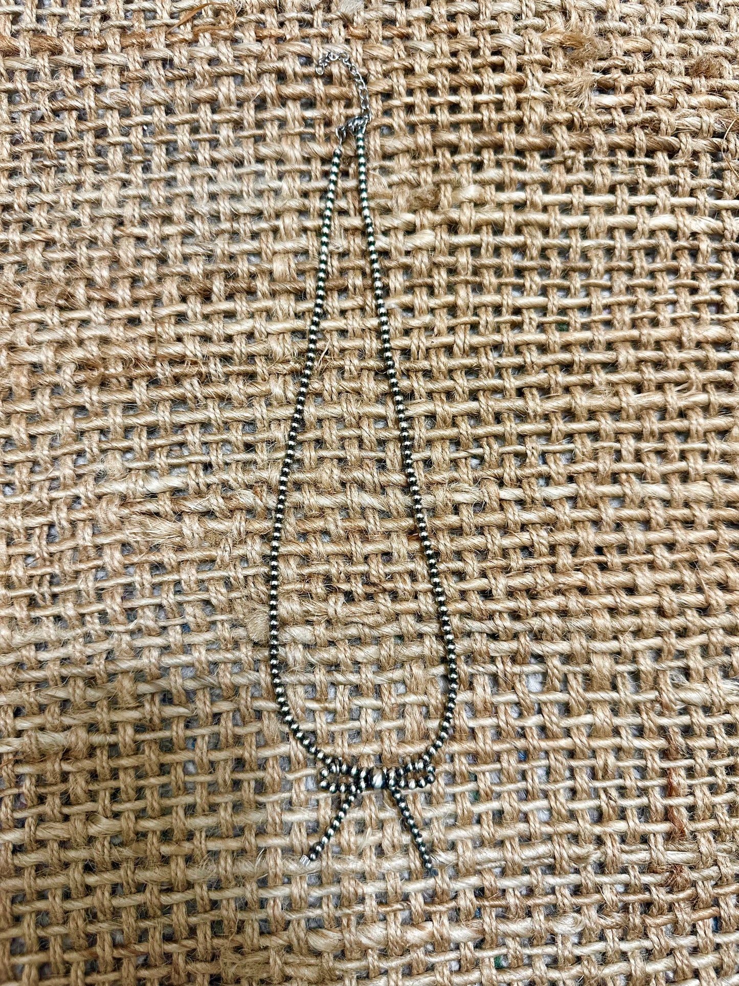 The long bow necklace
