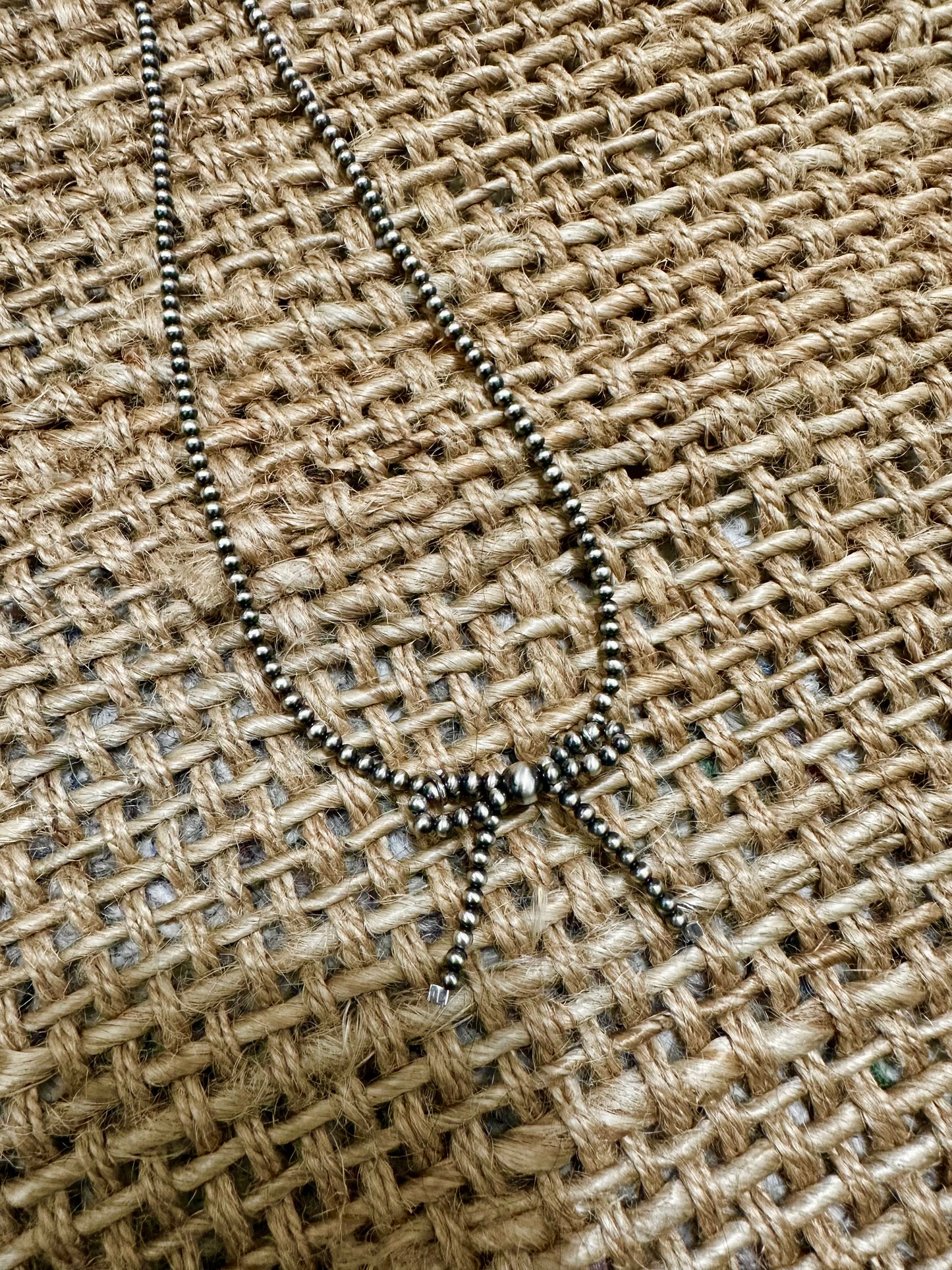 The long bow necklace