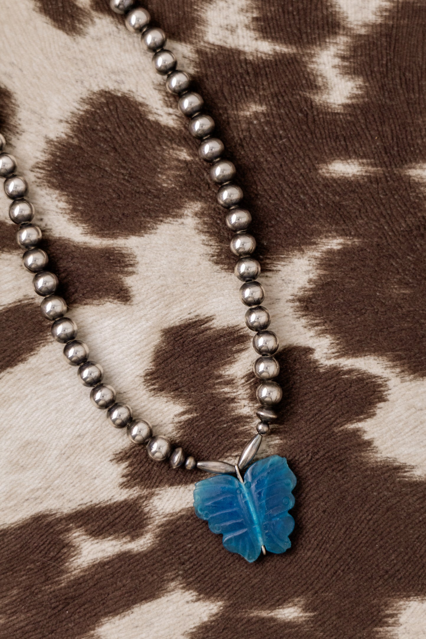 the blue jade necklace