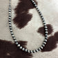 the pearly necklace