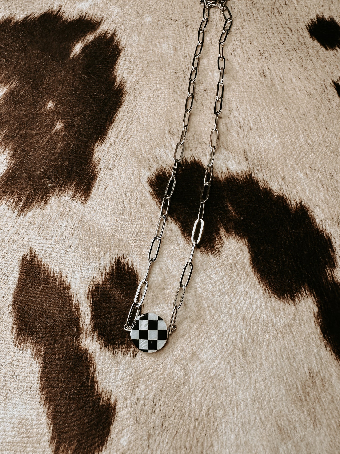 the checked out necklace