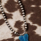 the blue jade necklace