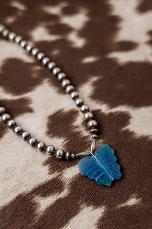 the blue jade necklace